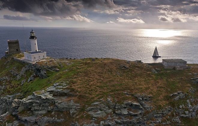 The Giraglia Rock greets the fleet at sunrise ©  Rolex/ Kurt Arrigo http://www.regattanews.com